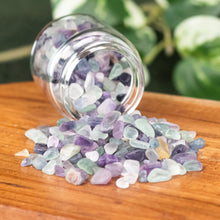 Load image into Gallery viewer, Fluorite Crystal Chips 1lb up close front facing displayed on a styled background - Down To Earth
