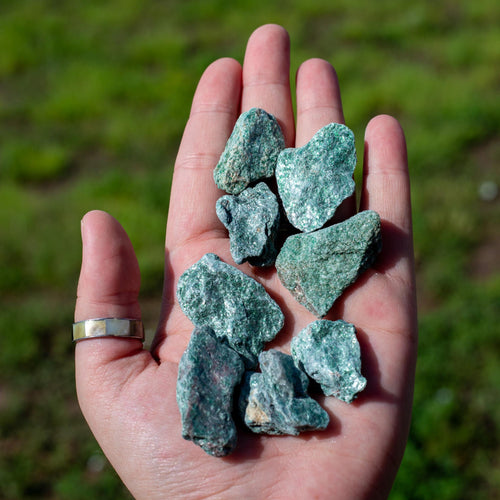 Fuchsite Raw in the palm of a Hand - Down To Earth