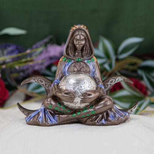 Gaia Moon Statue with a floral background front side - Down to Earth 