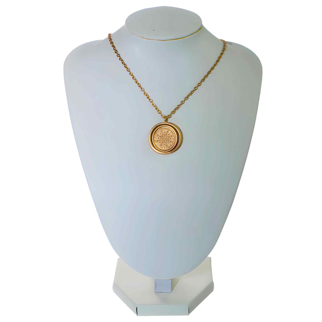 Gold Mantra Medallion Necklace on Display - Down To Earth