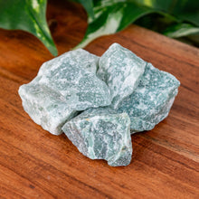 Load image into Gallery viewer, Green Quartz Raw on a wooden surface high angle - Down to Earth
