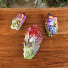 Load image into Gallery viewer, Green &amp; Red Aura Quartz Point top down on a style background - Down To Earth
