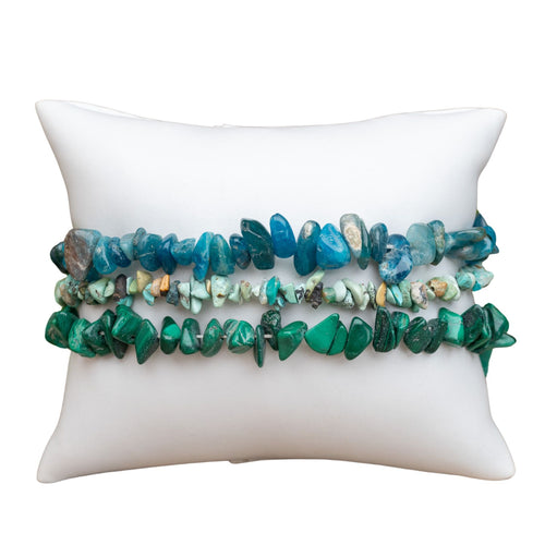 Crystal Chip Bracelets Group on white pillow - Down To Earth