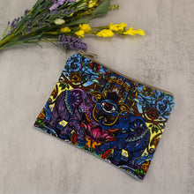 Load image into Gallery viewer, Hamsa Dreams Cosmetic Bag on a style background - Down To Earth
