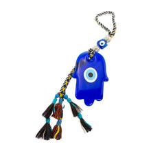 Load image into Gallery viewer, "Blue evil eye door hanger charm with colorful tassels on a white background," - Down to Earth.
