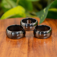 Load image into Gallery viewer, Thick Hematite Ring displayed on a wooden surface - Down to Earth
