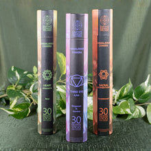 Load image into Gallery viewer, Himalayan Chakra Incense Sticks w/Burner front side of packaging group photo displayed on a styled background - Down To Earth
