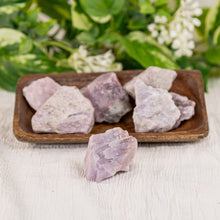 Load image into Gallery viewer, Kunzite Raw displayed on a colorful background showcasing one piece - Down to Earth
