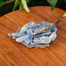 Load image into Gallery viewer, Blue Kyanite Blade on a wooden surface - Down to Earth 
