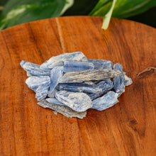 Load image into Gallery viewer, Blue Kyanite Blade on a wooden surface high angle - Down to Earth 
