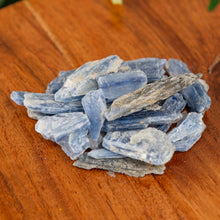 Load image into Gallery viewer, Blue Kyanite Blade on a wooden surface close up - Down to Earth 
