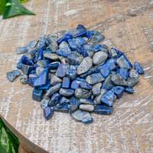 Load image into Gallery viewer, Lapis Crystal Chips on a wooden surface styled photo - Down to Earth
