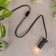 Load image into Gallery viewer, Large Lamp Cord &amp; Bulb displayed on a colorful background while being lit top down angle - Down to Earth
