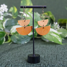 Load image into Gallery viewer, Leather Geometric Semicircle Dangle Earrings on the stand displayed on a styled background - Down To Earth
