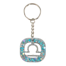 Load image into Gallery viewer, Libra Glitter Resin Keychain on a white background - Down To Earth
