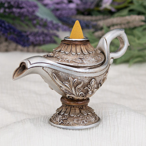 Magical Lamp Backflow Incense Burner styled photo with flowers in the foreground - Down to Earth