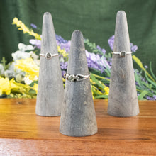Load image into Gallery viewer, Moldavite Ring on stand group photo on a style background - Down To Earth
