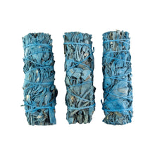 Load image into Gallery viewer, "Three bundles of Nag Champa White Sage smudge sticks on a white background," - Down to Earth.
