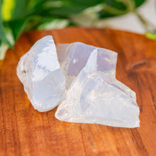 Load image into Gallery viewer, Opalite Raw on a wooden surface high angle - Down to Earth 
