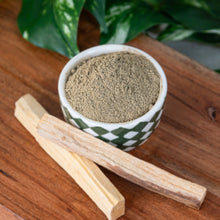 Load image into Gallery viewer, Palo Santo Powder 1lb in a ceramic bowl with palo santo sticks beside - Down to Earth

