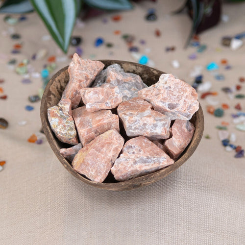 Bowl filled with Raw Peach Moonstone chunks - Down to Earth 