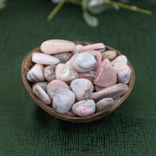 Load image into Gallery viewer, Pink Opal in a coconut shell on a green cloth - Down to Earth 
