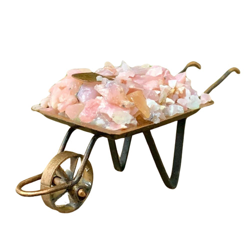 Pink Opal Crystal Chips inside a metal Wheelbarrow - Down To Earth Crystal Tabletop Decor