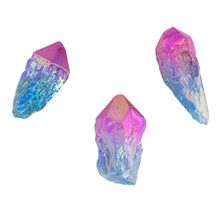 Load image into Gallery viewer, Pink &amp; Blue Aura Quartz Points side facing on a style background - Down To Earth
