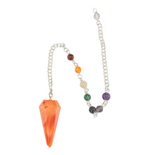 Load image into Gallery viewer, Premiere Carnelian Faceted Pendulum with 7 Chakra top down on a white background - Down To Earth

