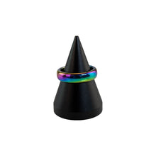 Load image into Gallery viewer, "Black cone-shaped stand with a Rainbow Hematite ring on top of a white background," - Down to Earth.

