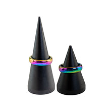Load image into Gallery viewer, "Two cone-like black cylinder stands with Rainbow Hematite rings on them on top of a white background," - Down to Earth.
