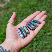 Load image into Gallery viewer, Rainbow Aura Quartz Points in the Palm of  a Hand - Down To Earth
