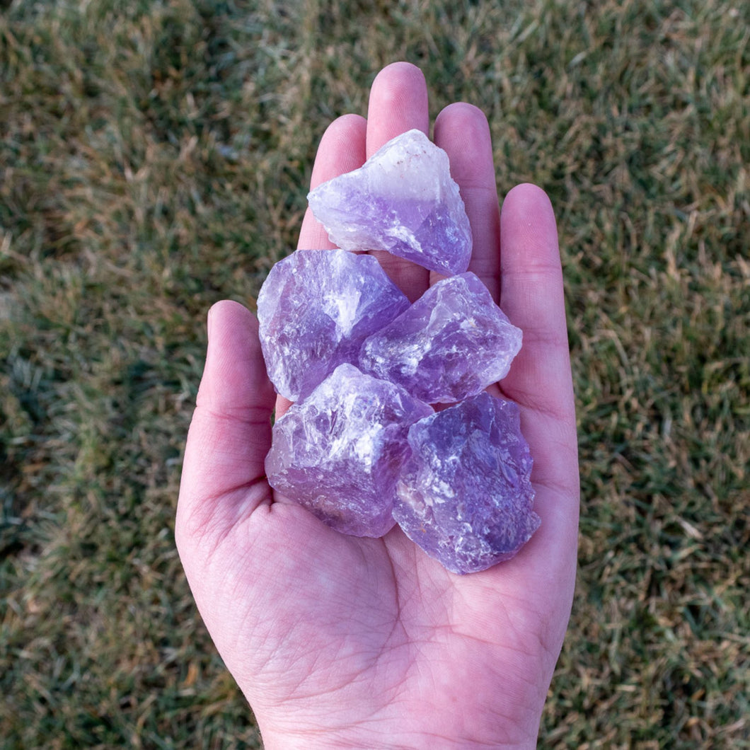 Raw Amethyst in the Palm of a Hand - Down To Earth