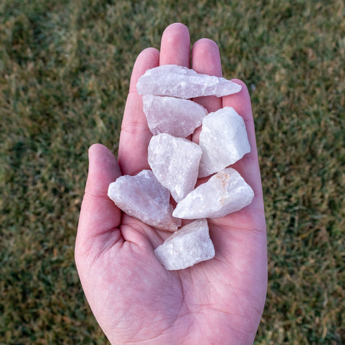 Raw Kunzite in the Palm of a Hand - Down To Earth