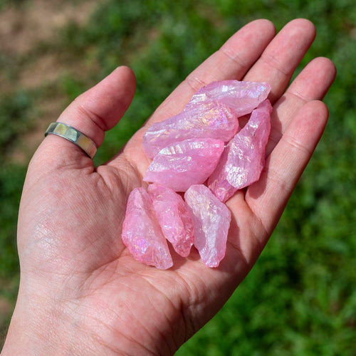 Raw Rose Aura Quartz Points in the Palm of a Hand - Down To Earth