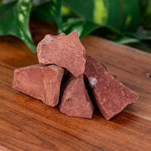 Load image into Gallery viewer, Red Jasper Raw on a wooden surface high angle - Down to Earth
