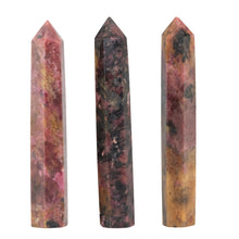 Load image into Gallery viewer, Rhodonite Obelisk group photo on a white background - Down To Earth
