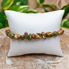 Load image into Gallery viewer, Rhyolite Tumbled Stone Bracelet on White Pillow Styled Photo - Down To Earth
