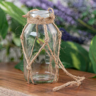Hanging Glass Bottle sat on a wooden surface - Down to Earth