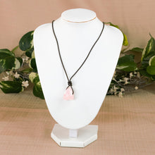 Load image into Gallery viewer, Rose Quartz Leather Cord Necklace on a stand on a style background - Down To Earth
