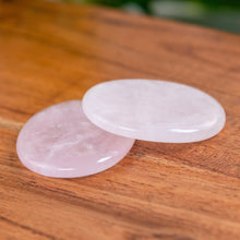 Load image into Gallery viewer, Rose Quartz Palm Stones on a wooden surface low angle - Down to Earth 
