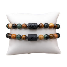 Load image into Gallery viewer, "Two Sagittarius Zodiac Bracelets on a white pillow," - Down to Earth.
