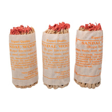 Load image into Gallery viewer, &quot;Three sandalwood incense rope bundles in paper wraps on a white background,&quot; - Down to Earth.
