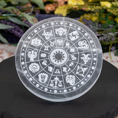 Selenite Zodiac Charging Plate in styled format photo - Down to Earth