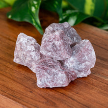 Load image into Gallery viewer, Strawberry Calcite Raw Brazil on a wooden surface high angle - Down to Earth
