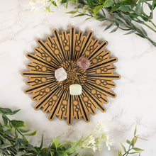 Load image into Gallery viewer, Sunburst Crystal Grid top down, crystal on top with flowers on a silted background - Down To Earth
