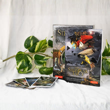 Load image into Gallery viewer, The Steam Punk Tarot Deck with the guidebook and cards spread out on a style background - Down To Earth

