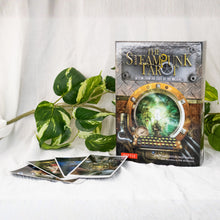 Load image into Gallery viewer, The Steam Punk Tarot Deck with cards spread out on a style background - Down To Earth

