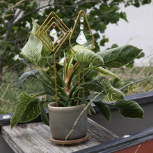 Load image into Gallery viewer, Trellis Gold Metal Rhombus &amp; Tear with Styled Background on plant - Down To Earth
