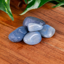 Load image into Gallery viewer, Blue Quartz Tumbled on a wooden surface high angle - Down to Earth 
